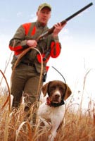 a hunter with his dog